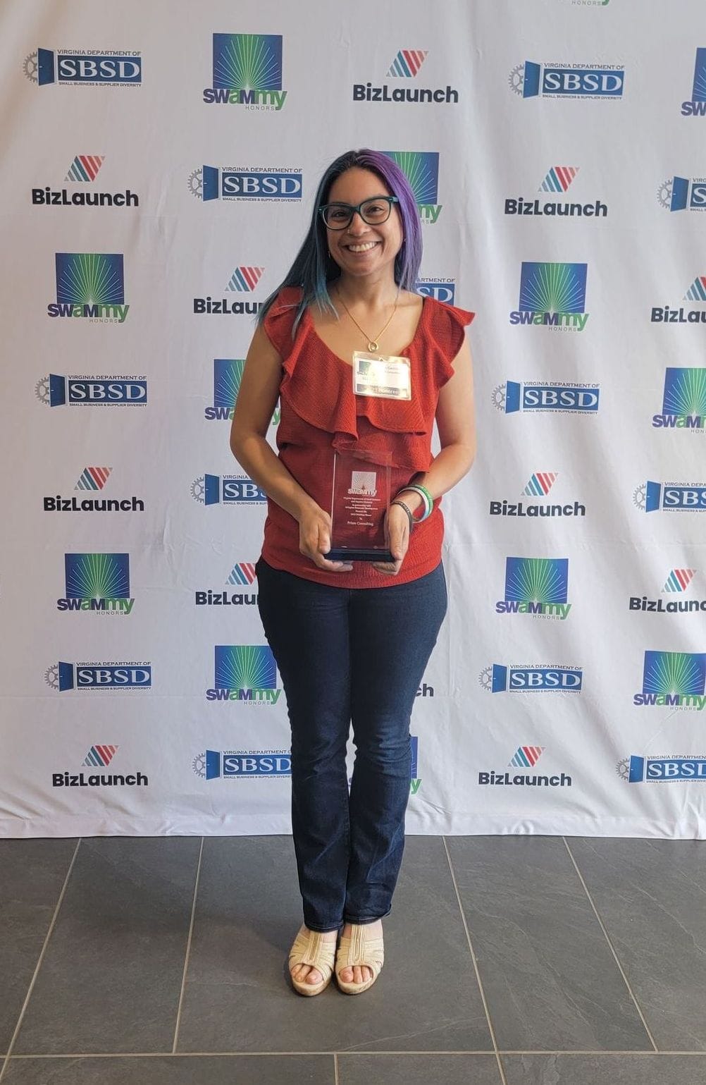 Joa holds her SWaMmy Award, 2024